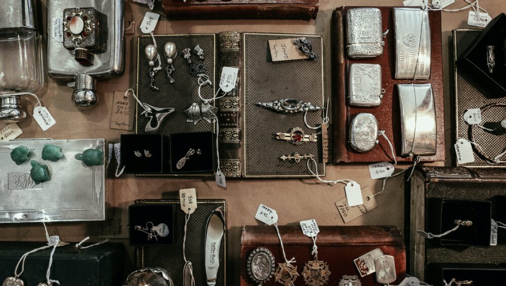 Professional team cataloging items for auction with care and expertise