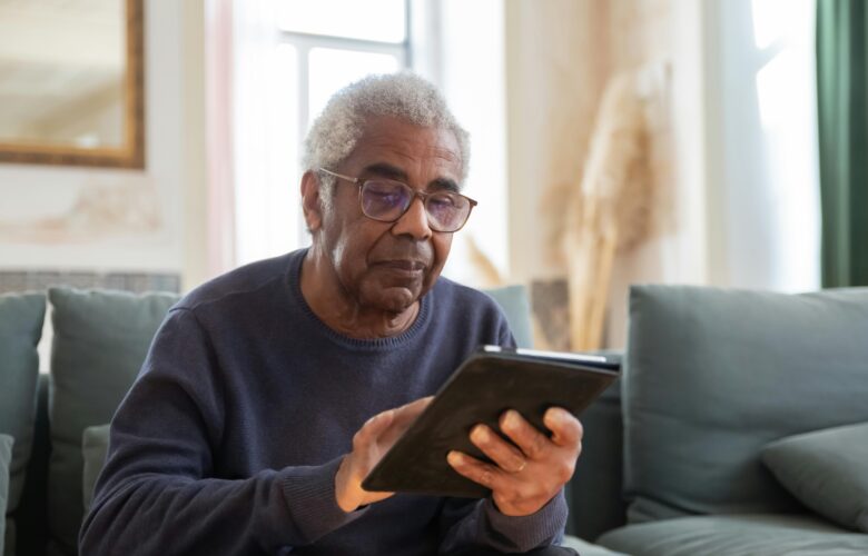 Senior on tablet
