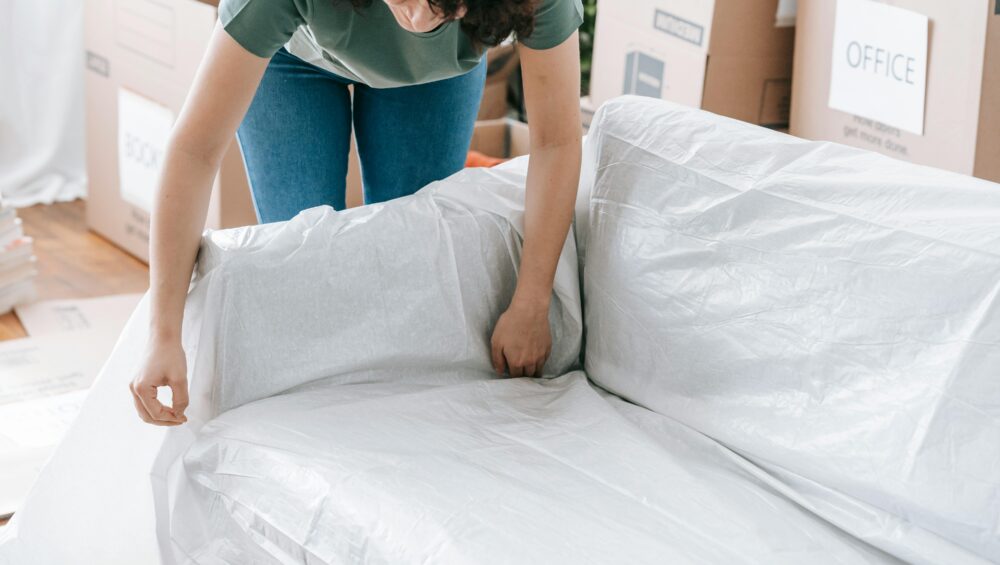 Organizing and sorting personal belongings in a home after a loved one's passing.