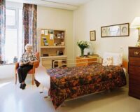 Happy senior in retirement community